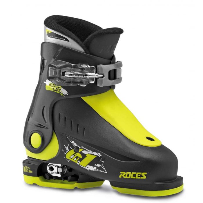 Chaussures de ski Kinder : vue latérale avec coques jaune et noire.
