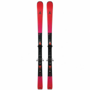 Atomic Redster S7 ski beide ski's volledig zichtbaar staand, rode bovenzijde met roze/magenta kleurovergang naar zwarte staart, 'S7' model opschrift en Atomic M12 GW bindingen